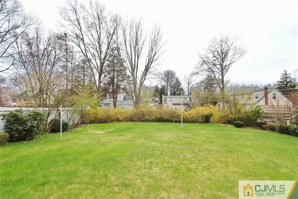 93 Morningside Road Colonia, NJ 07067 - Photo 23 of 23 a view of a yard with a house