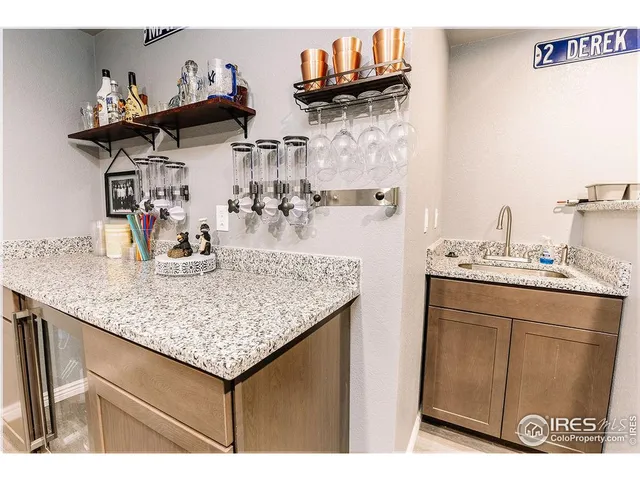 a view of kitchen with furniture and wooden floor