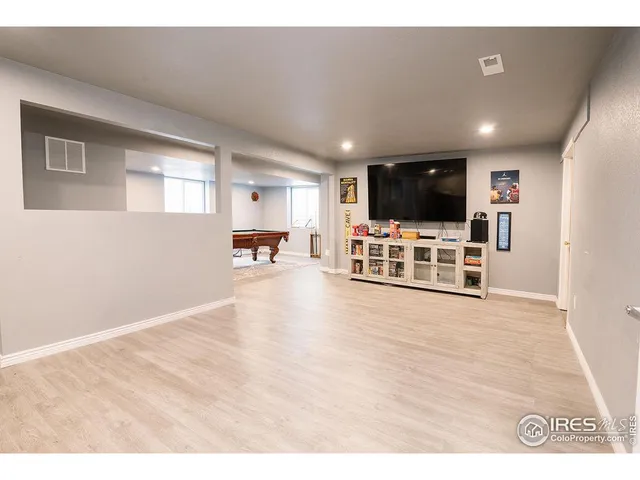a view of a kitchen with a refrigerator
