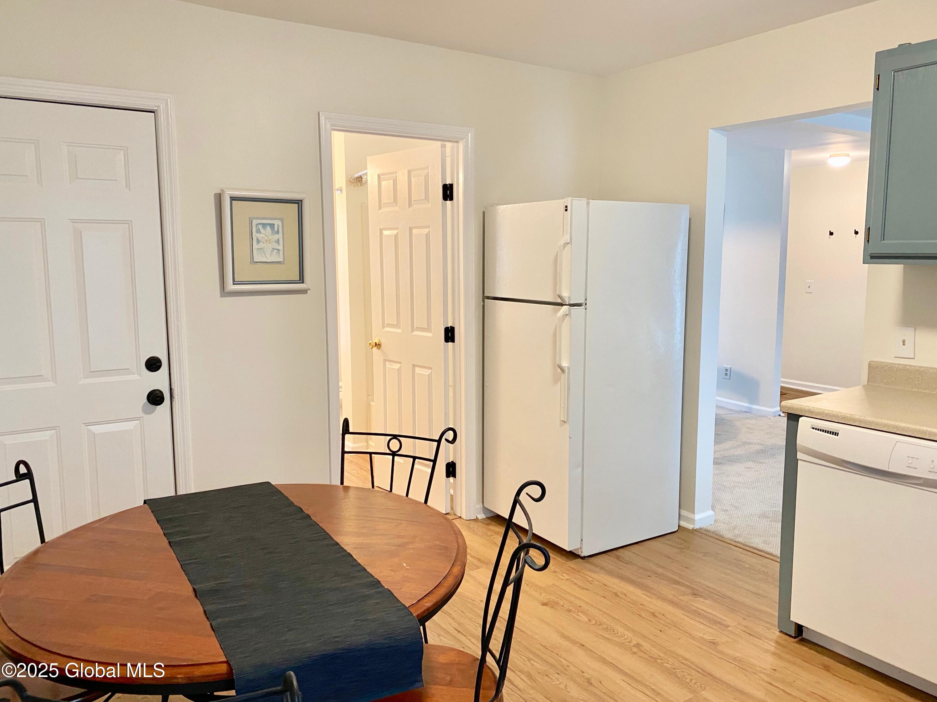 59 Van Dam Street, Unit 2 Saratoga Springs, NY 12866 - Photo 8 of 19 59VanDamStUnit2KitchtoLR