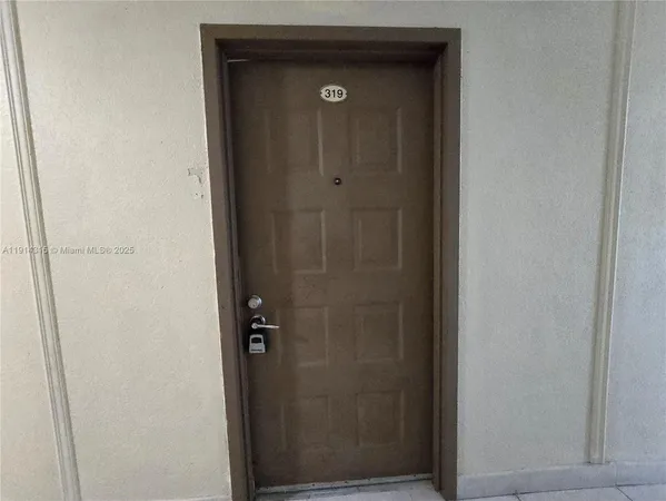 a bathroom with a glass door