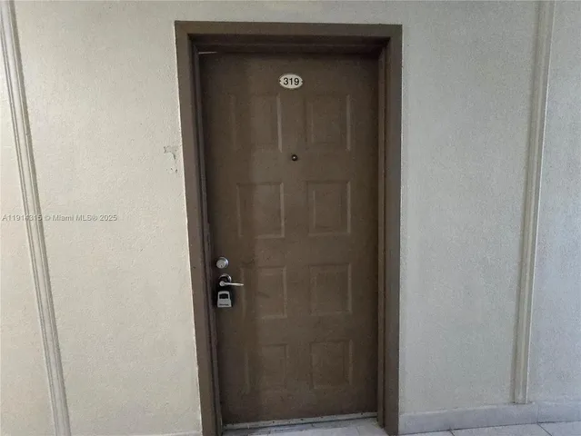 a bathroom with a glass door
