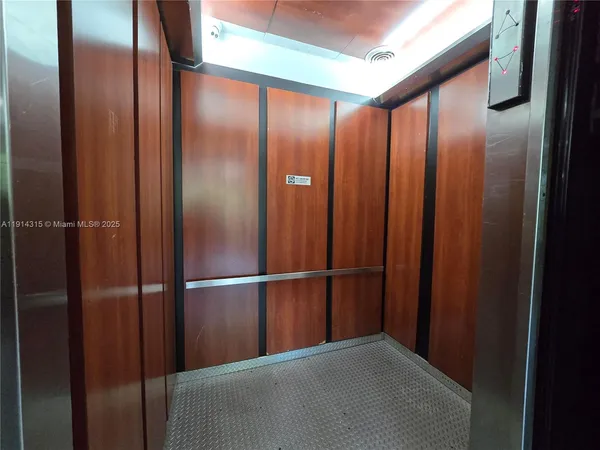 a view of elevator with hallway