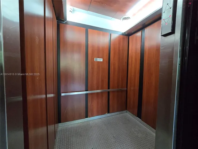 a view of elevator with hallway