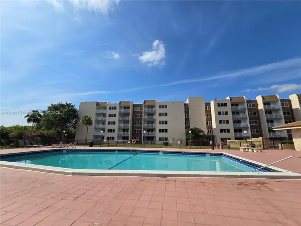 a view of building with yard