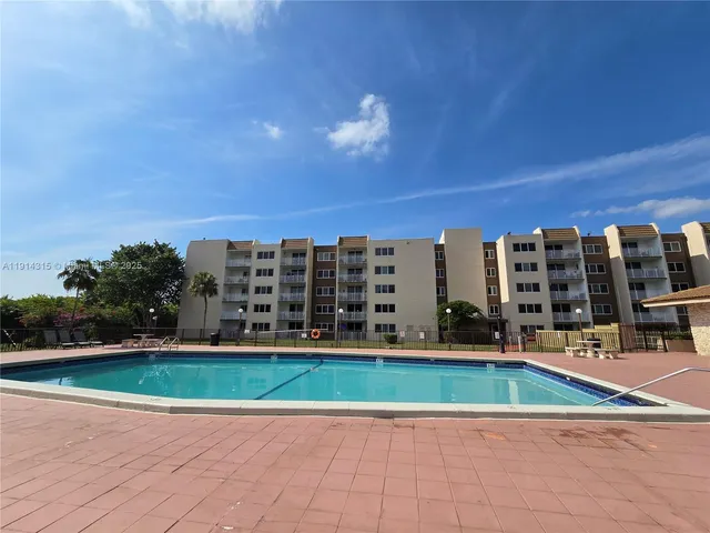 a view of building with yard