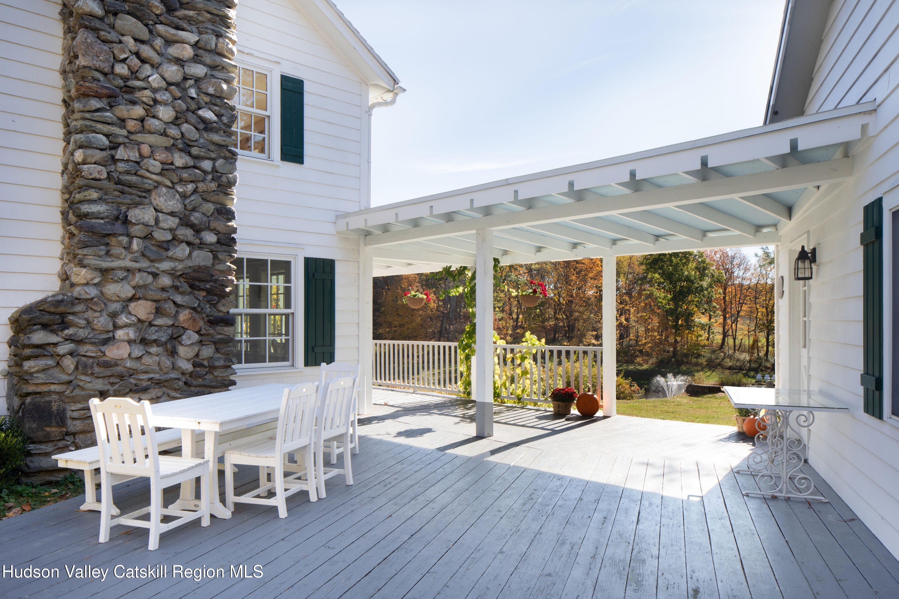 321 Tompkins Road Ancram, NY 12502 - Photo 13 of 54 Covered deck to and from 3 bay garage