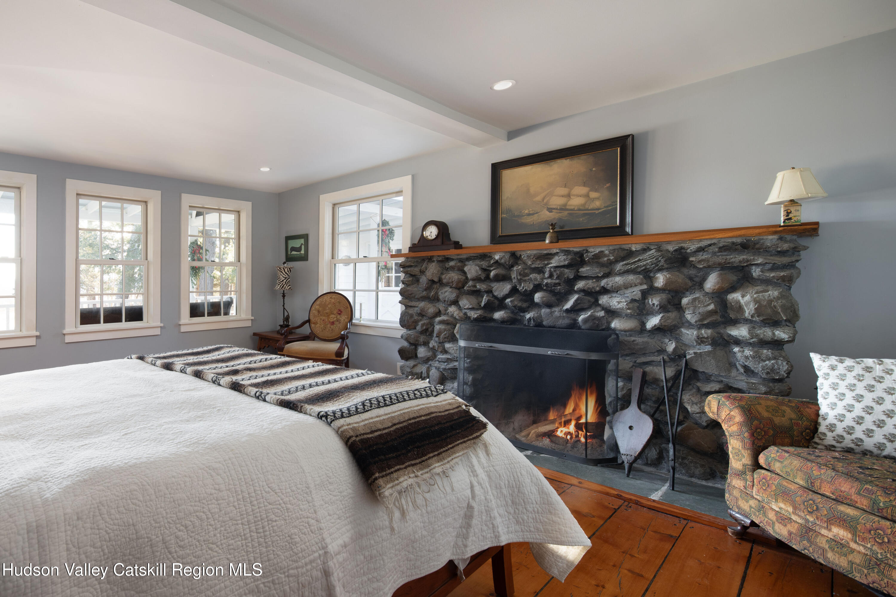 321 Tompkins Road Ancram, NY 12502 - Photo 41 of 54 Stone fireplace in primary suite