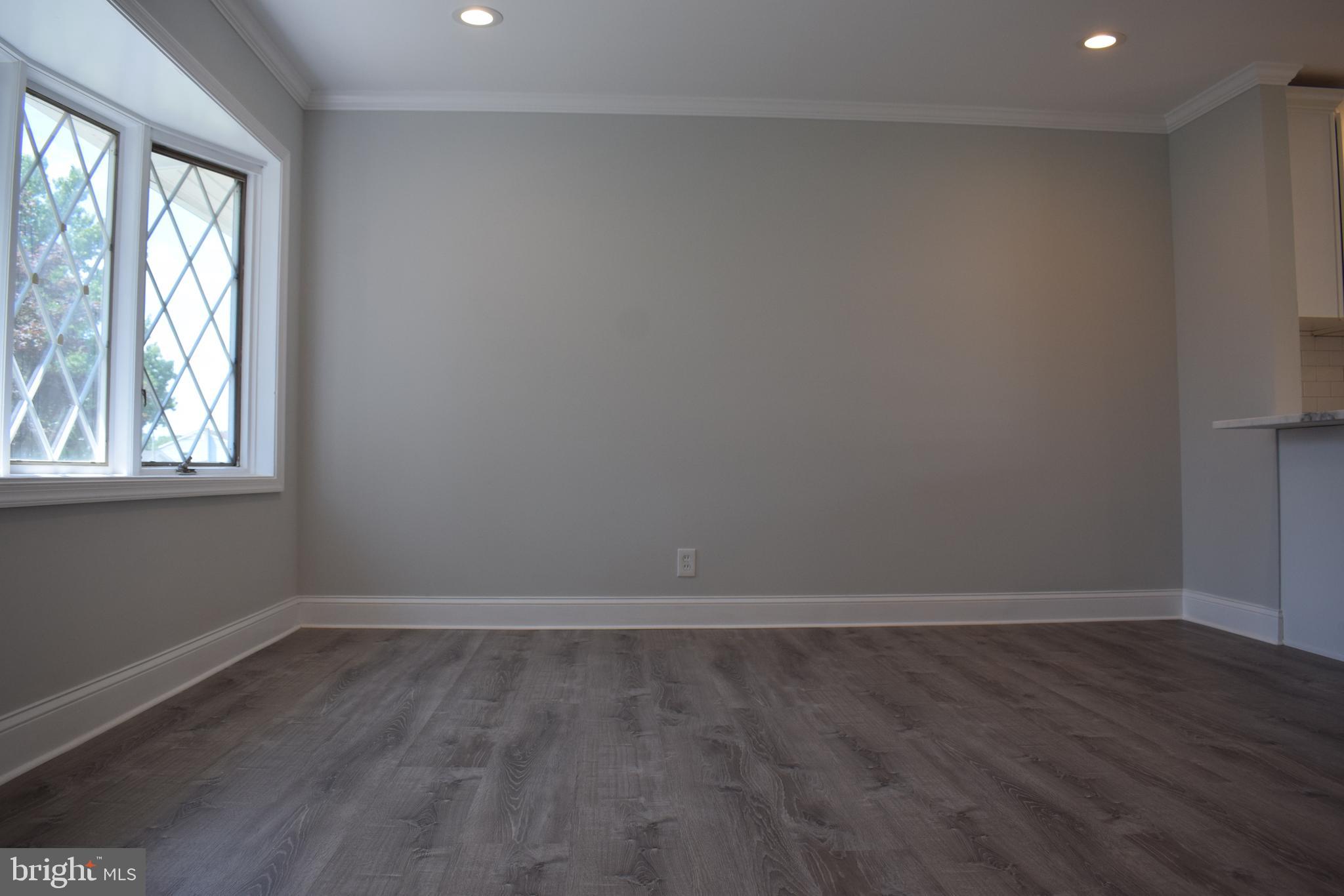 825 Dunbury Road Fairless Hills, PA 19030 - Photo 7 of 24 Great Room with Crown Molding