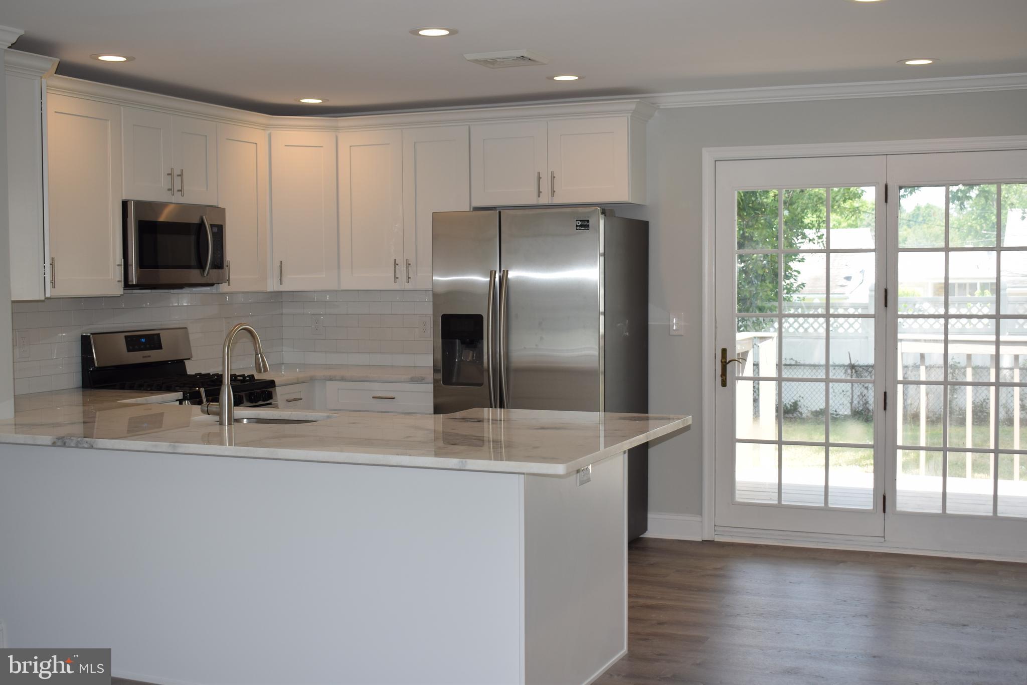 825 Dunbury Road Fairless Hills, PA 19030 - Photo 8 of 24 New Kitchen, w/door to back deck
