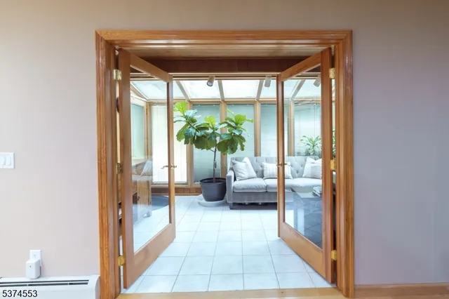 a view of utility room and living room