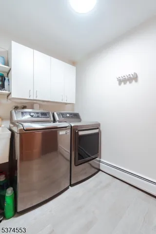 a stove top oven sitting inside of a kitchen