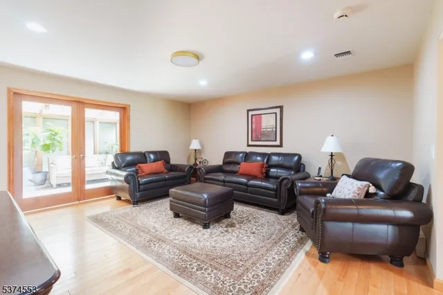 a living room with furniture window and a lamp