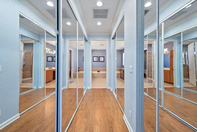 a aerial view of a house with swimming pool and a yard