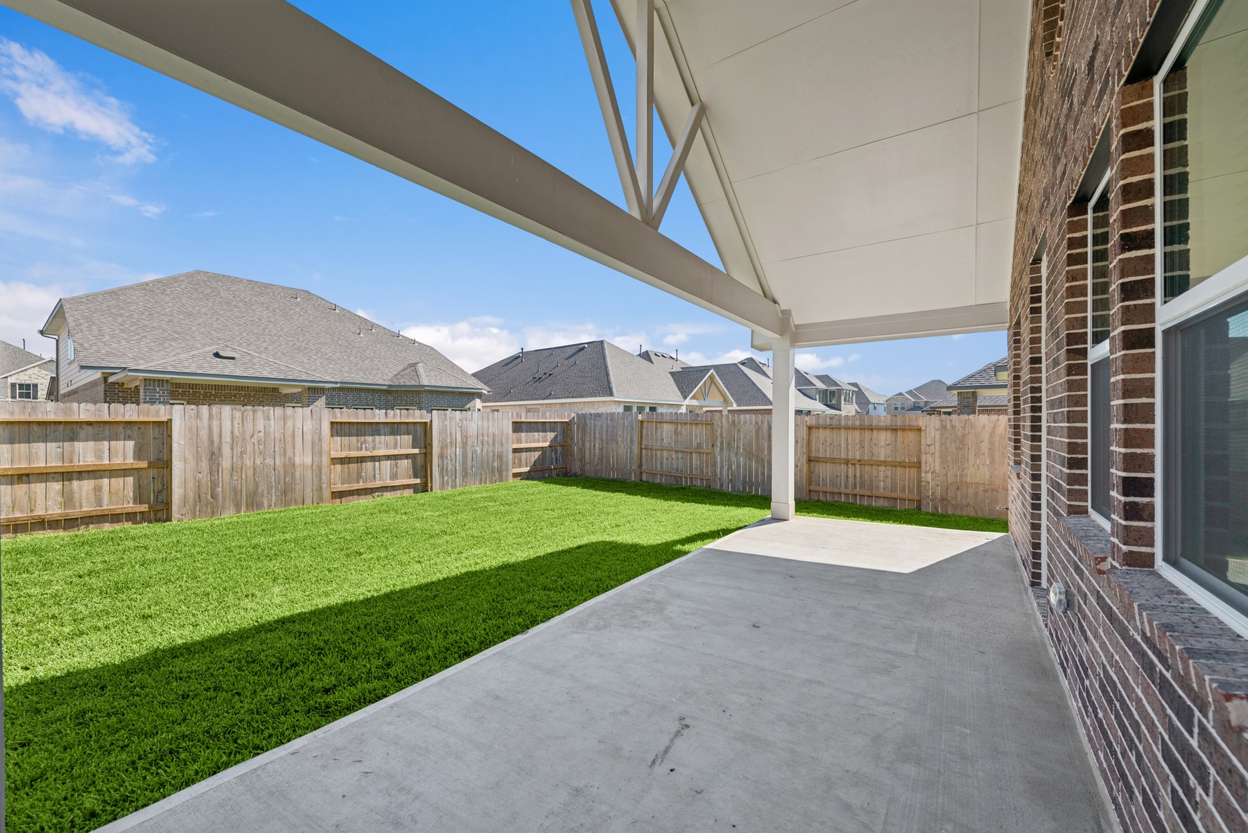 2614 Good Morrow Drive Rosenberg, TX 77471 - Photo 23 of 47 Large covered patio with vaulted ceiling