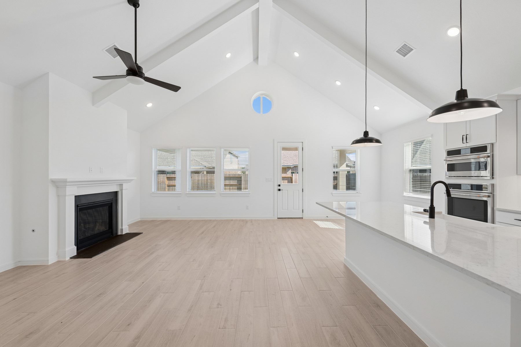 2614 Good Morrow Drive Rosenberg, TX 77471 - Photo 6 of 47 Open great room with fireplace