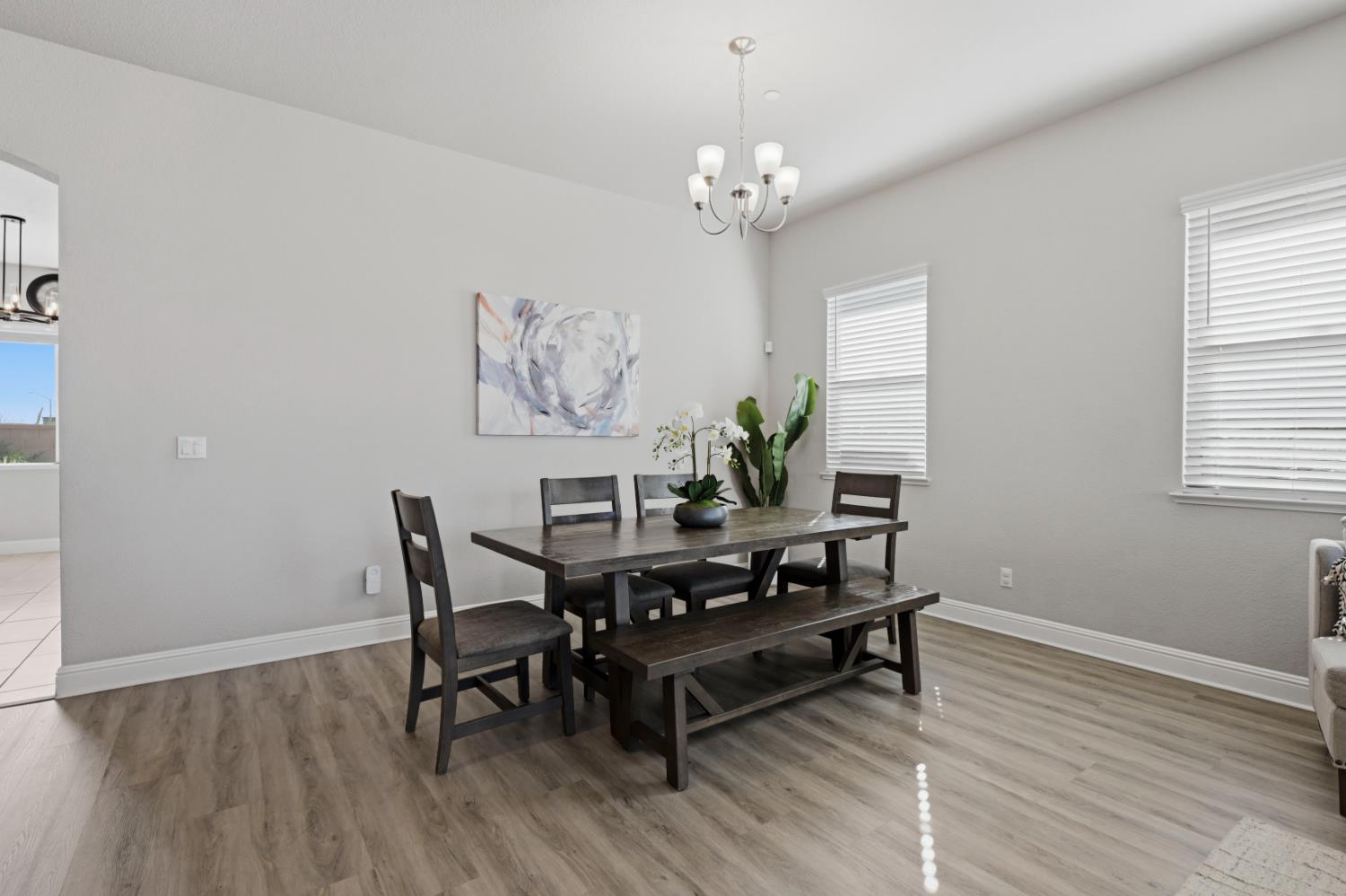 2012 Van Ruiten Drive Lodi, CA 95242 - Photo 9 of 48 a living room with furniture and a chandelier