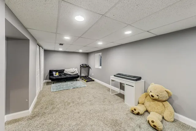 a room with furniture and a window