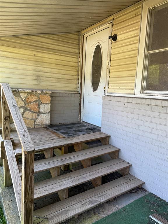 116 5th Street Whitney, TX 76692 - Photo 5 of 23 a view of entryway with wooden floor