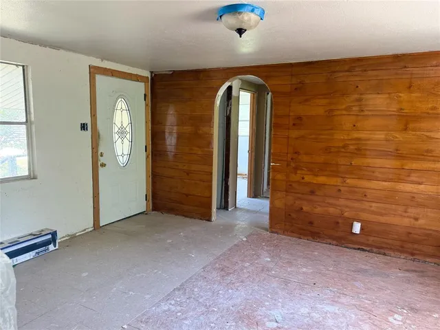 an empty room with windows