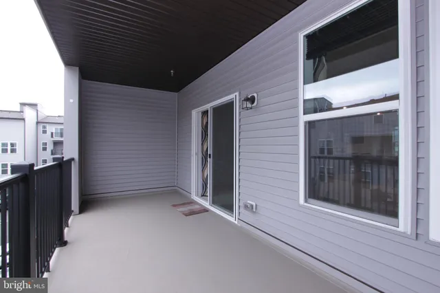 a kitchen with stainless steel appliances granite countertop wooden cabinets a sink and dishwasher