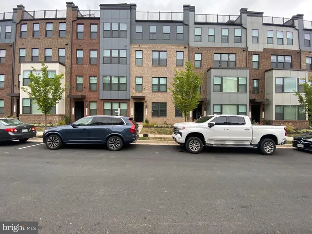 a view of a cars parked in front of a building