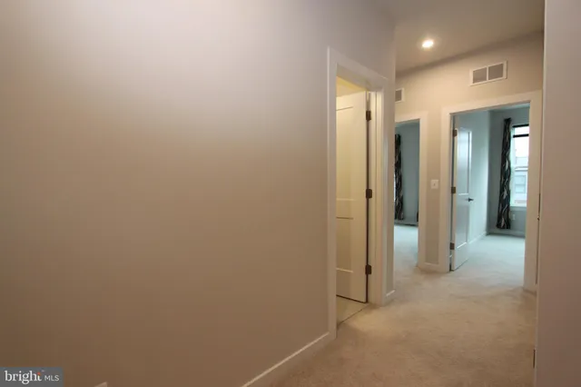 a bathroom with a sink a mirror and a shower