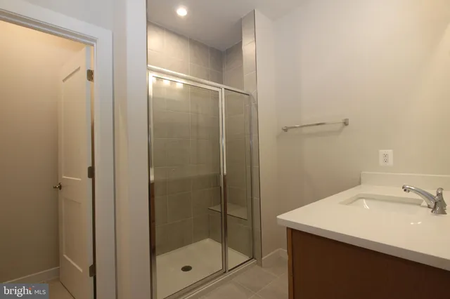 a view of an empty room with windows