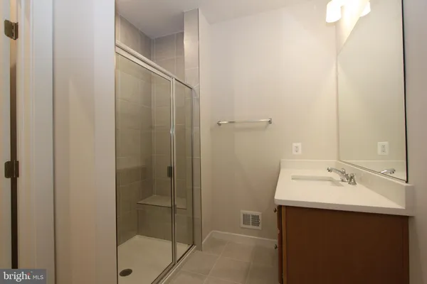 a view of a hallway with entryway in a room