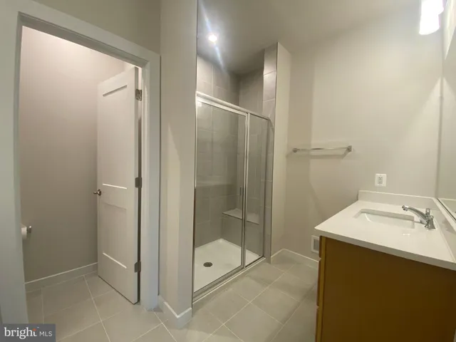 a view of kitchen and dining room with wooden floor