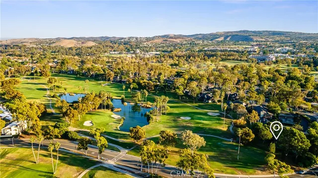 a bathroom with a potted plant and a sink