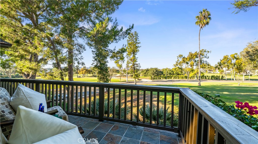 30 Nuevo, Unit 15 Irvine, CA 92612 - Photo 13 of 69 a view of a balcony with lake view and a potted plant