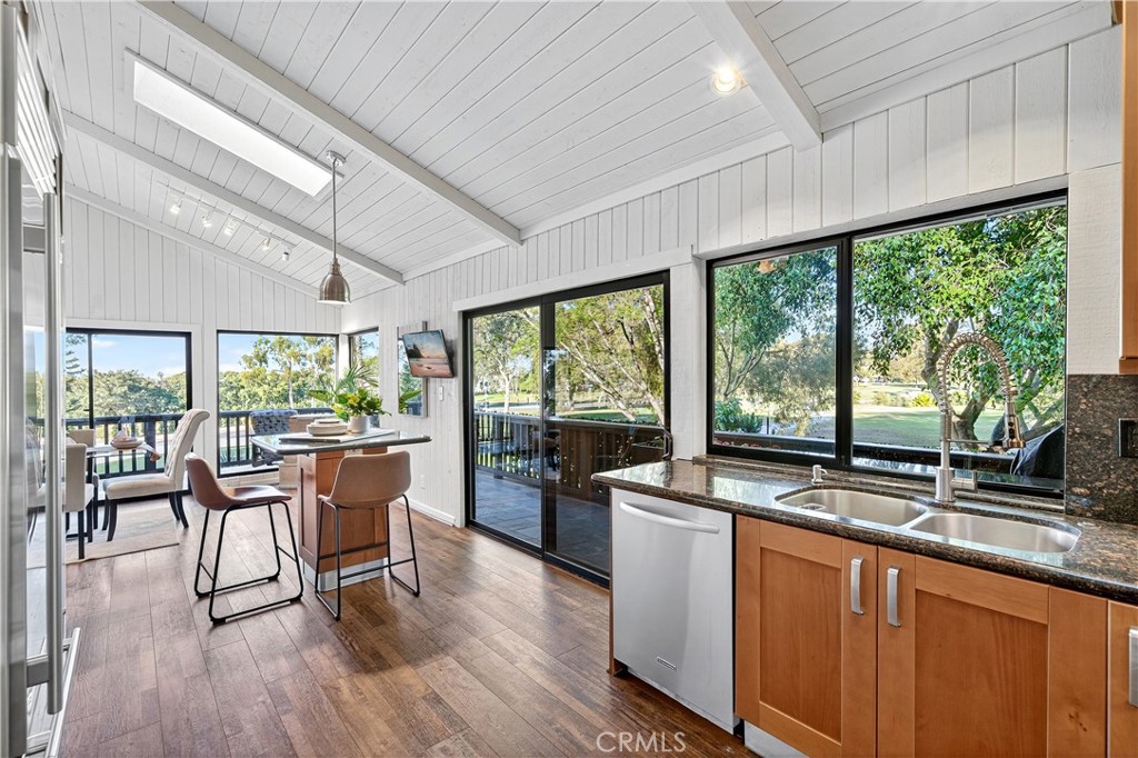 30 Nuevo, Unit 15 Irvine, CA 92612 - Photo 25 of 69 a view of a dining room with furniture window and outside view
