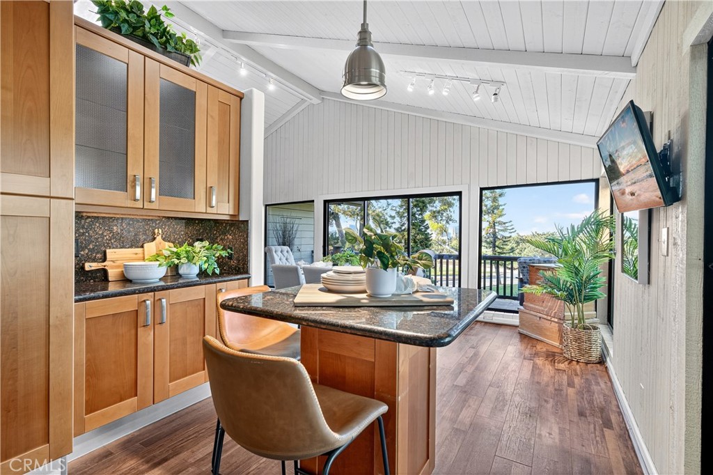 30 Nuevo, Unit 15 Irvine, CA 92612 - Photo 26 of 69 a dining room with furniture window and wooden floor