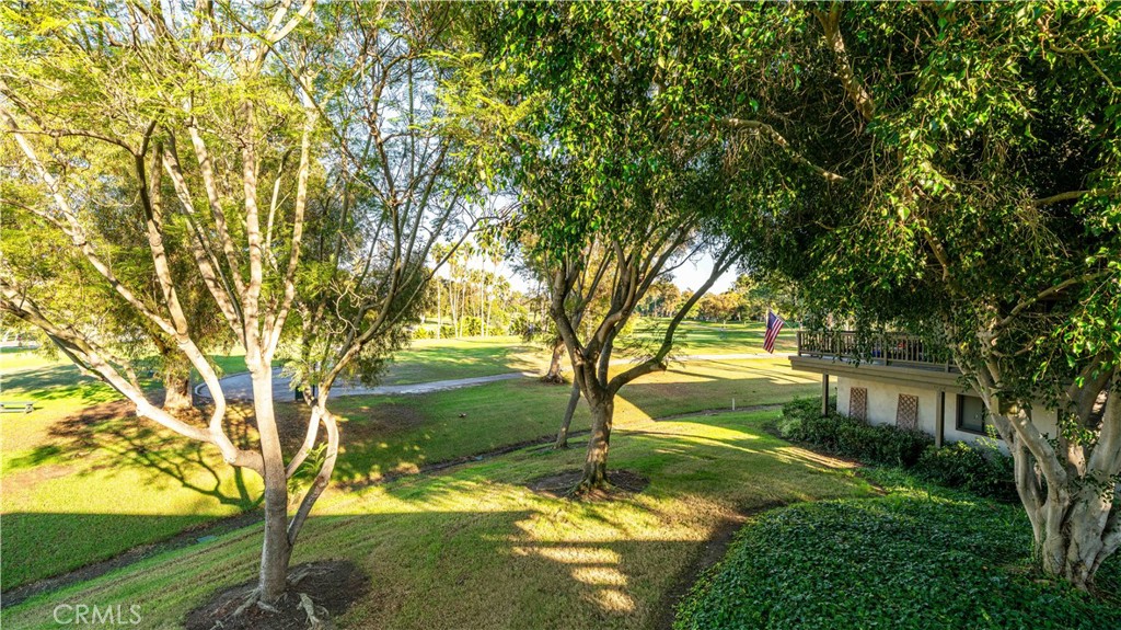 30 Nuevo, Unit 15 Irvine, CA 92612 - Photo 28 of 69 a view of backyard with green space