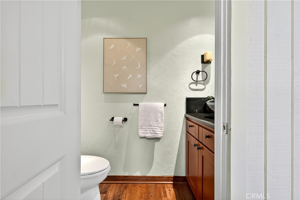 30 Nuevo, Unit 15 Irvine, CA 92612 - Photo 30 of 69 a bathroom with a toilet and a sink