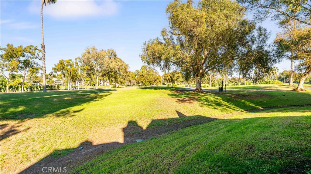 30 Nuevo, Unit 15 Irvine, CA 92612 - Photo 46 of 69 a view of a lake with a big yard