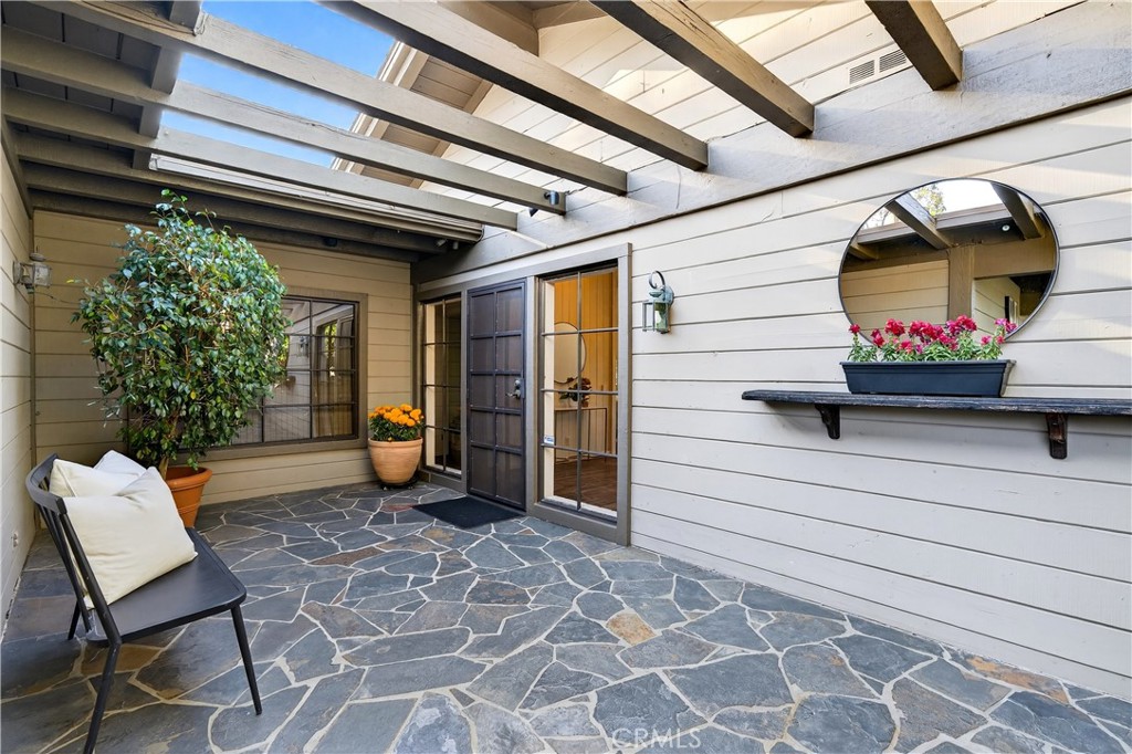 30 Nuevo, Unit 15 Irvine, CA 92612 - Photo 6 of 69 a view of a porch with seating space