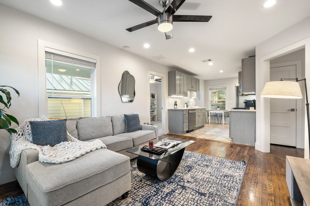 2702 Crest Avenue, Unit 1 Austin, TX 78702 - Photo 11 of 29 Warm hardwood floors create a comfortable and stylish foundation for the main living space.