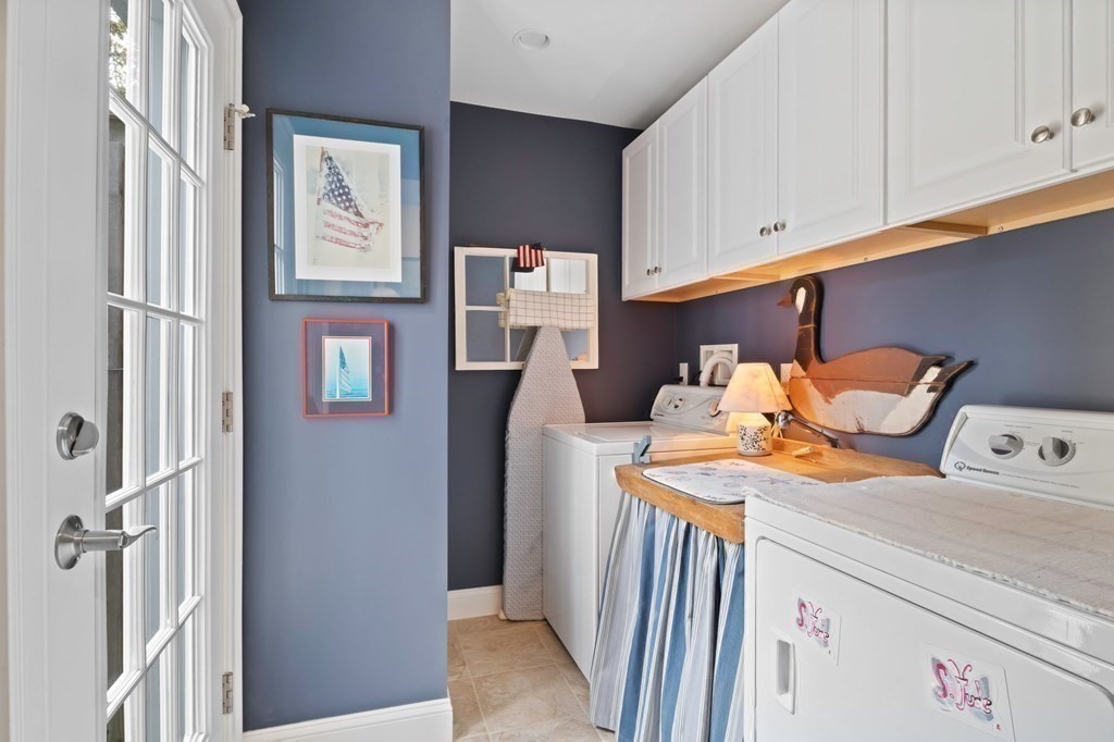 100 Round Cove Road Chatham, MA 02633 - Photo 18 of 38 a view of walk in closet with clothes and shoes