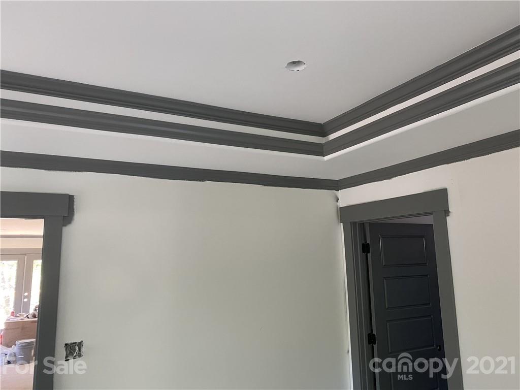 1216 Effingham Road Charlotte, NC 28208 - Photo 4 of 4 a room that has a window and a closet