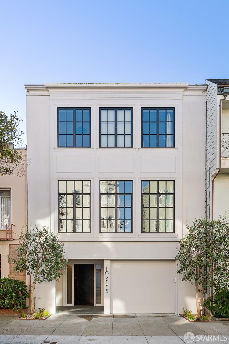 front view of house with large windows