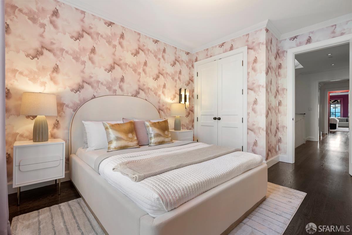 45 Capra Way San Francisco, CA 94123 - Photo 18 of 25 a bedroom with a large bed and a couch