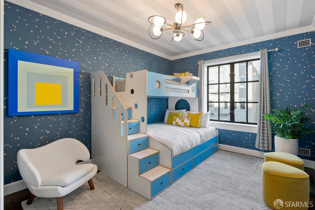 45 Capra Way San Francisco, CA 94123 - Photo 19 of 25 a bedroom with a bed and a chair with the potted plant