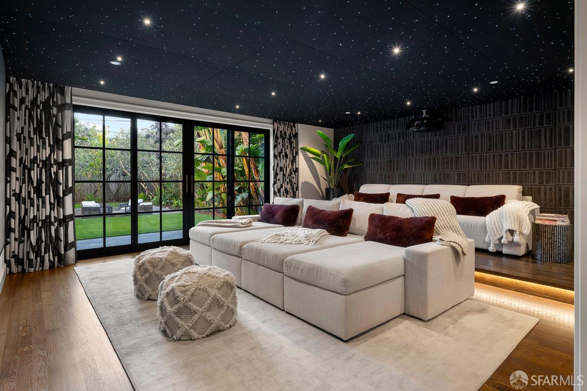 45 Capra Way San Francisco, CA 94123 - Photo 23 of 25 a living room with furniture and a floor to ceiling window