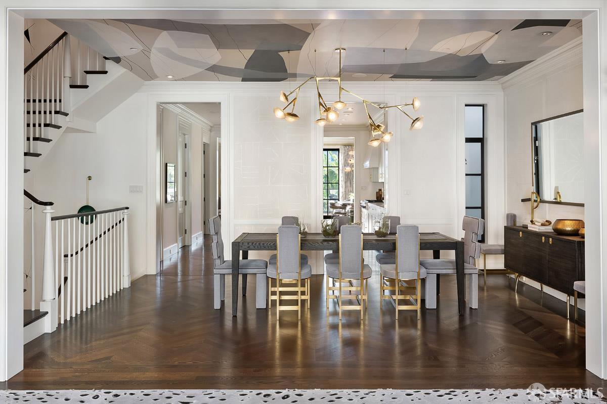 45 Capra Way San Francisco, CA 94123 - Photo 4 of 25 a view of dining room and livingroom with furniture wooden floor and a chandelier