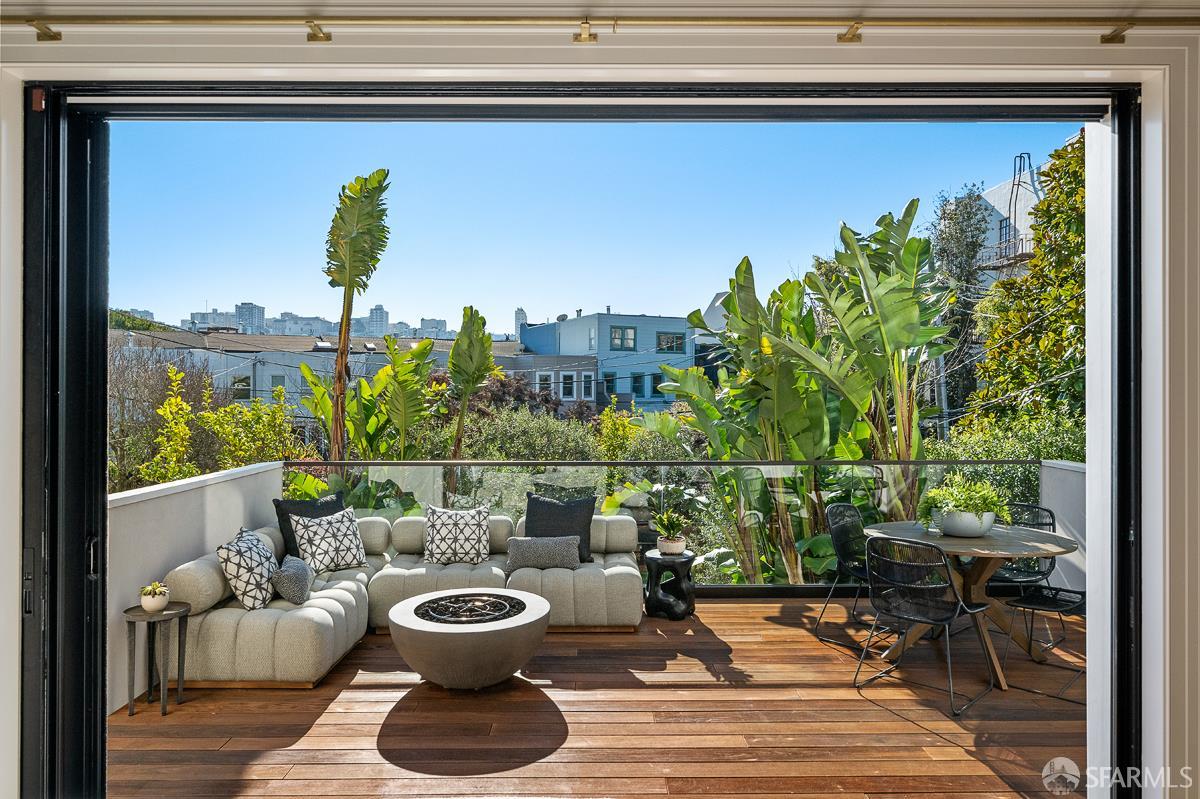 45 Capra Way San Francisco, CA 94123 - Photo 9 of 25 a view of a porch with furniture and a potted plant