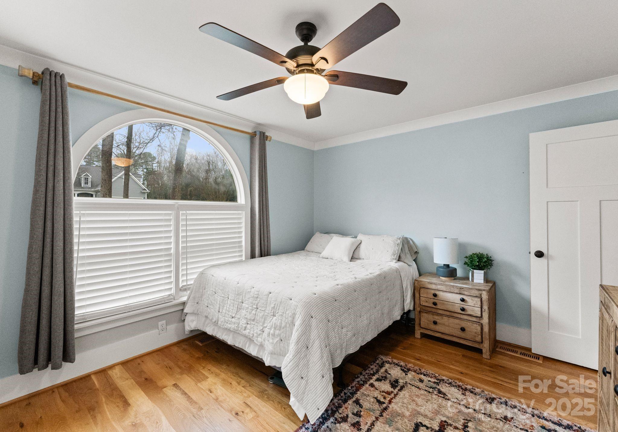 2550 Green Point Court Denver, NC 28037 - Photo 21 of 42 a bedroom with a bed and a window