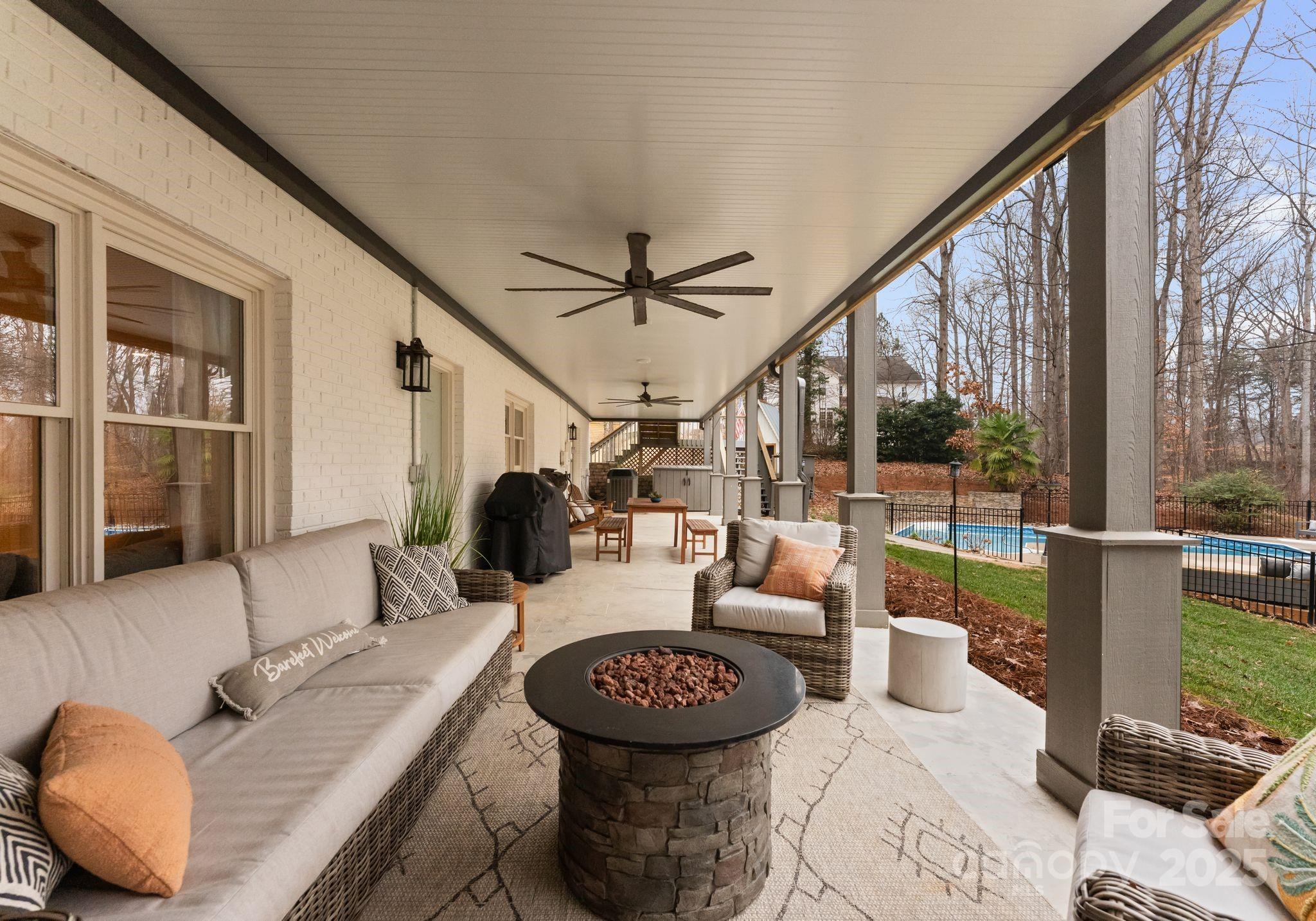 2550 Green Point Court Denver, NC 28037 - Photo 36 of 42 a living room with furniture and a large window