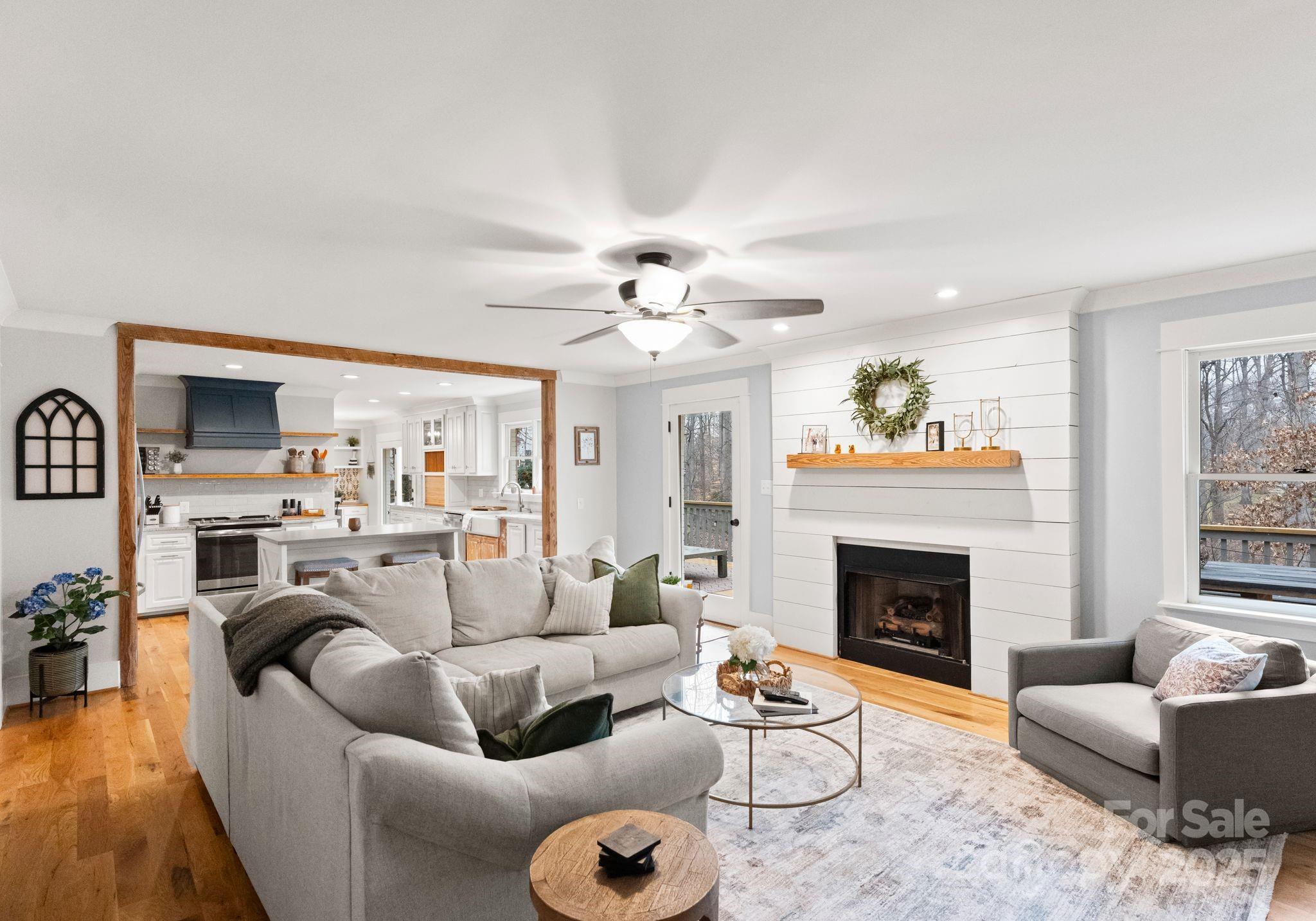 2550 Green Point Court Denver, NC 28037 - Photo 7 of 42 a living room with furniture fireplace and a window